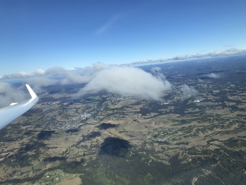 Soaring high above the Oaks with glider wing tip visible
